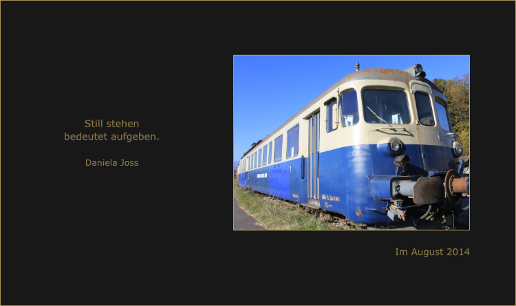 Elektrotriebwagen, OeBB ABDe 4/8 244 in blau-cremefarbener Lackierung.